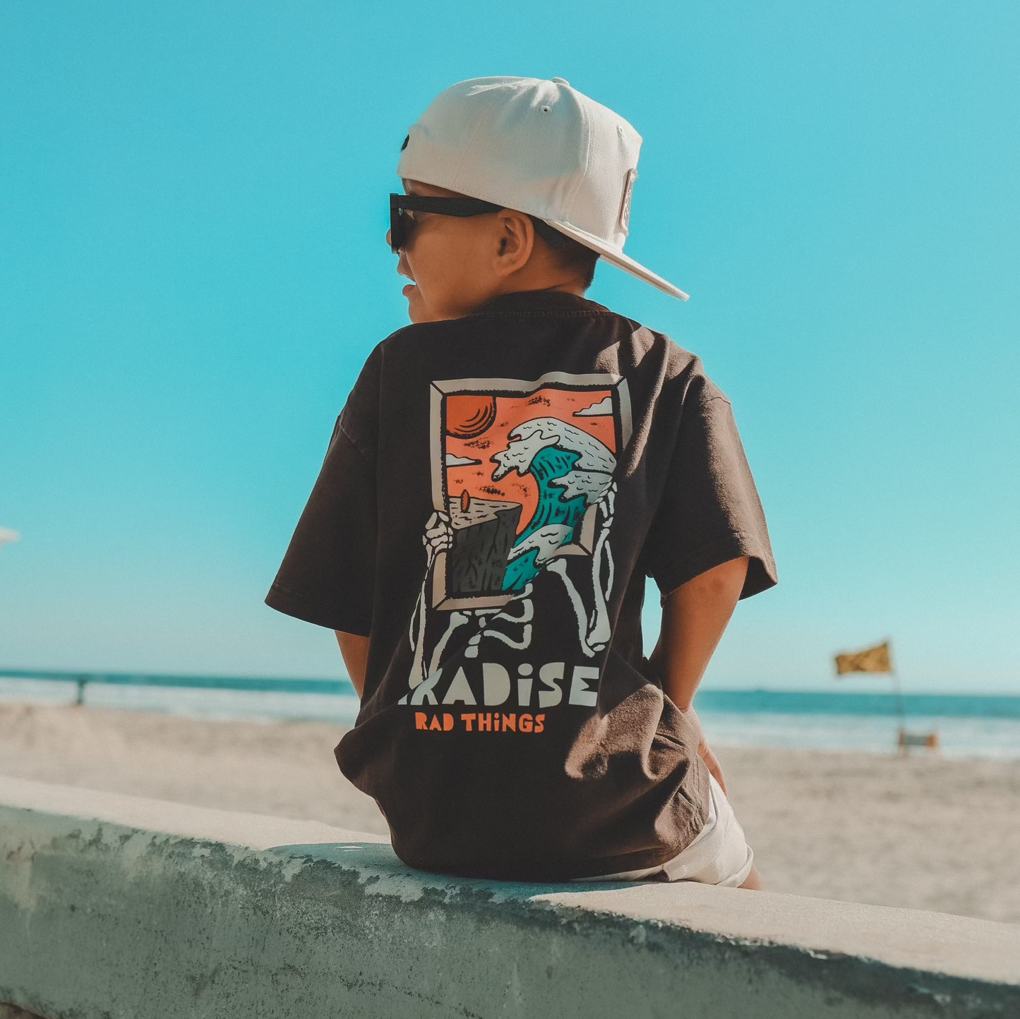Another Day In Paradise Tee